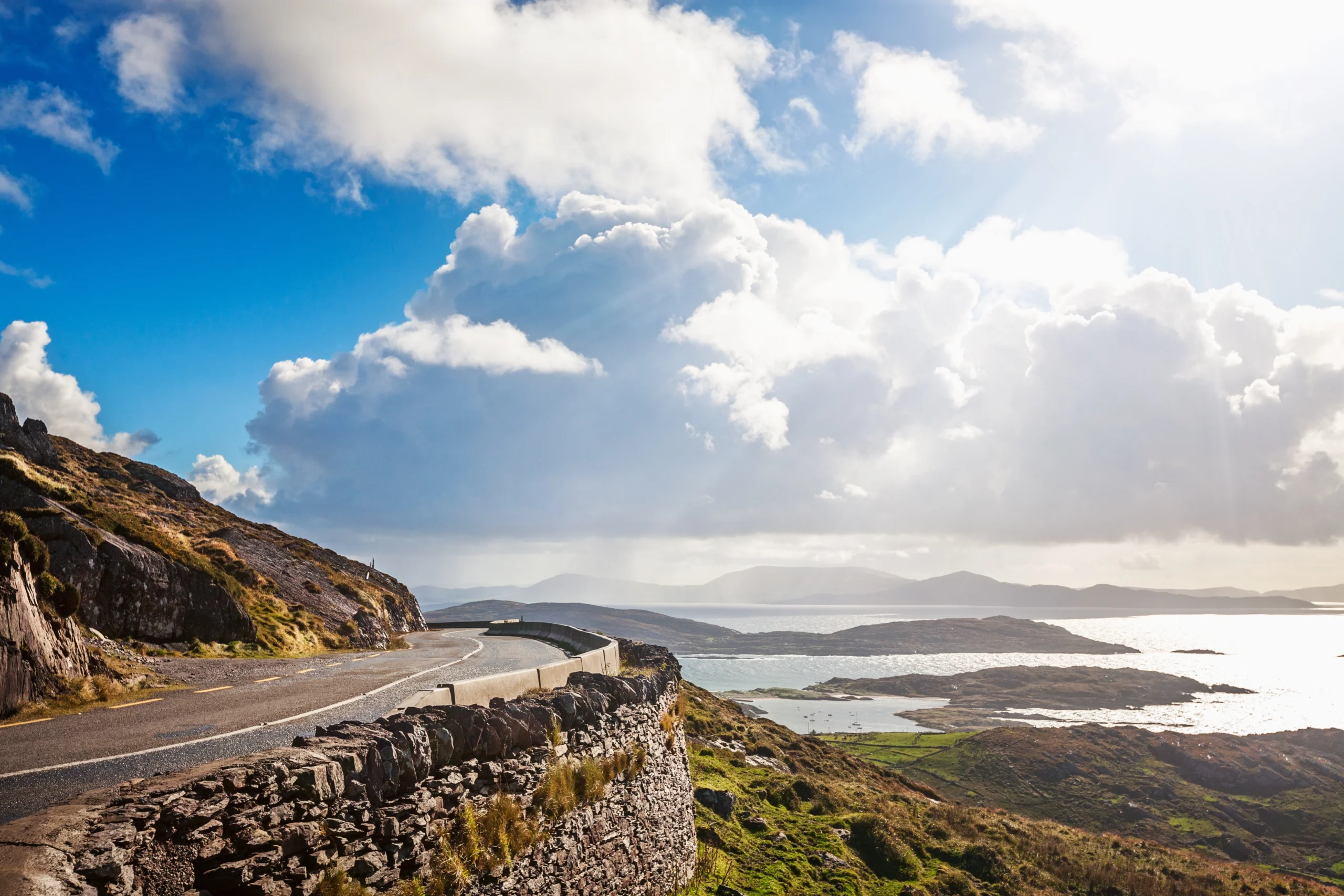 Ring of Kerry holiday homes in Ireland, mountain road overlooking Atlantic Ocean