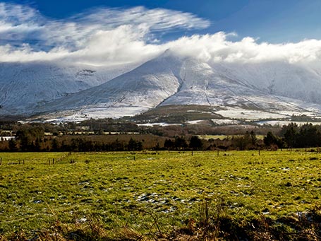 Galtee Mountains covered with snow and clouds, County Tipperary, Ireland