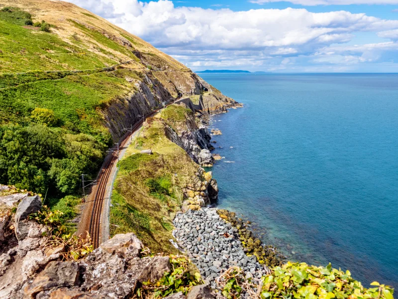 Coastal Holiday Homes in Wicklow - view from Cliff Walk Bray to Greystones with beautiful cliffs, sea and train tracks, Ireland