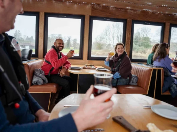 Group of friends enjoying Island Discovery, Erne Water Taxi Tours in Fermanagh © 2023 Rob Durston, All Rights Reserved - Embrace a Giant Spirit