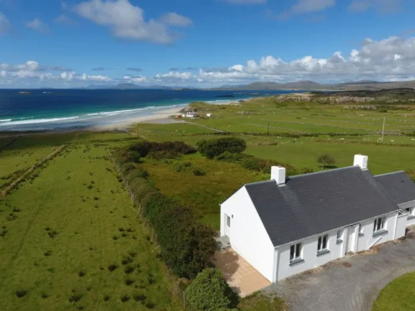 Aerial view of a coastal holiday home in Renvyle beside Connemara in Galway © Trident Holiday Homes