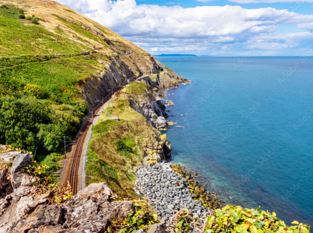 Coastal Holiday Homes in Wicklow - view from Cliff Walk Bray to Greystones with beautiful cliffs, sea and train tracks, Ireland