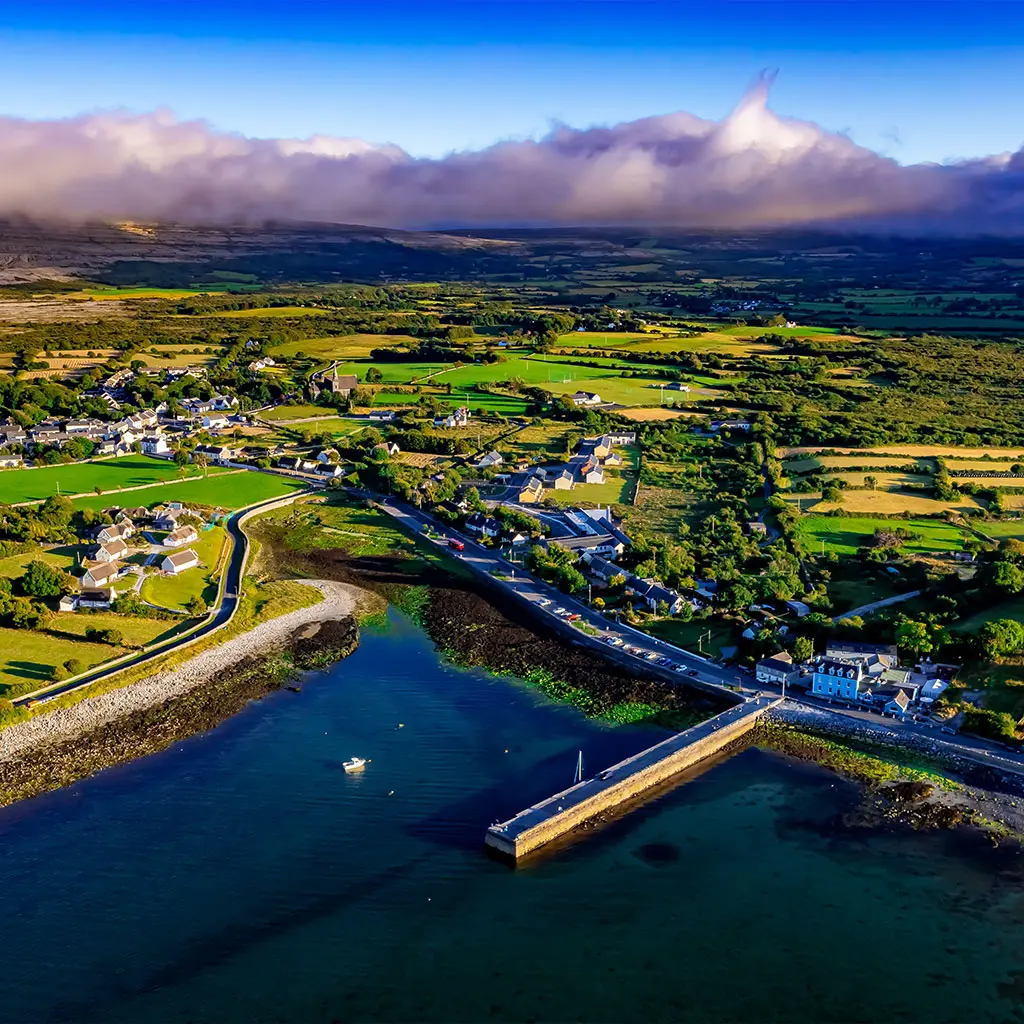 Aerial view of Ballyvaughan and the Burren in the background located on the west coast of Ireland in Clare © Adobe Stock