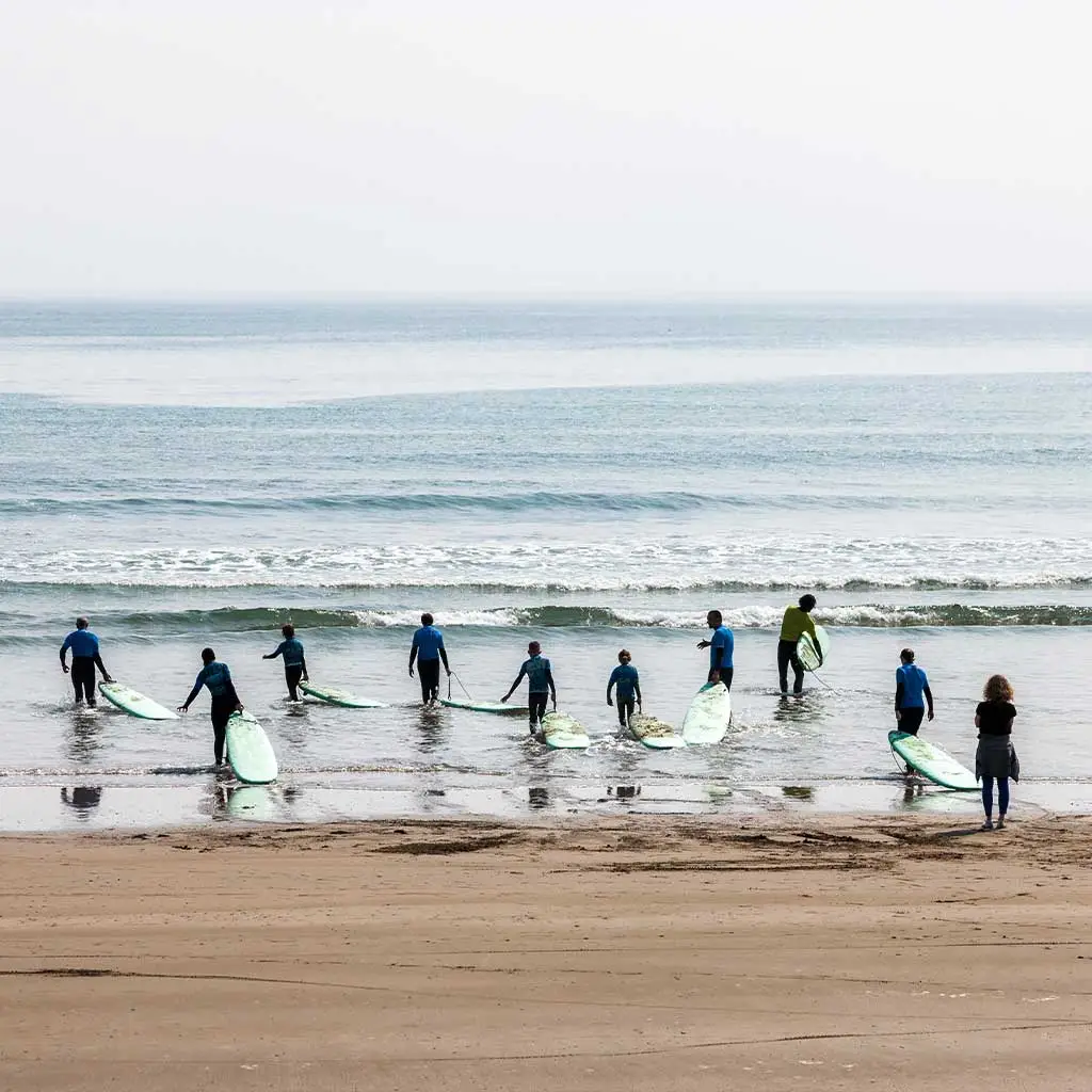 Holidaymakers enjoying a day surfing on Garretstown Beach in Cork © David Creedon