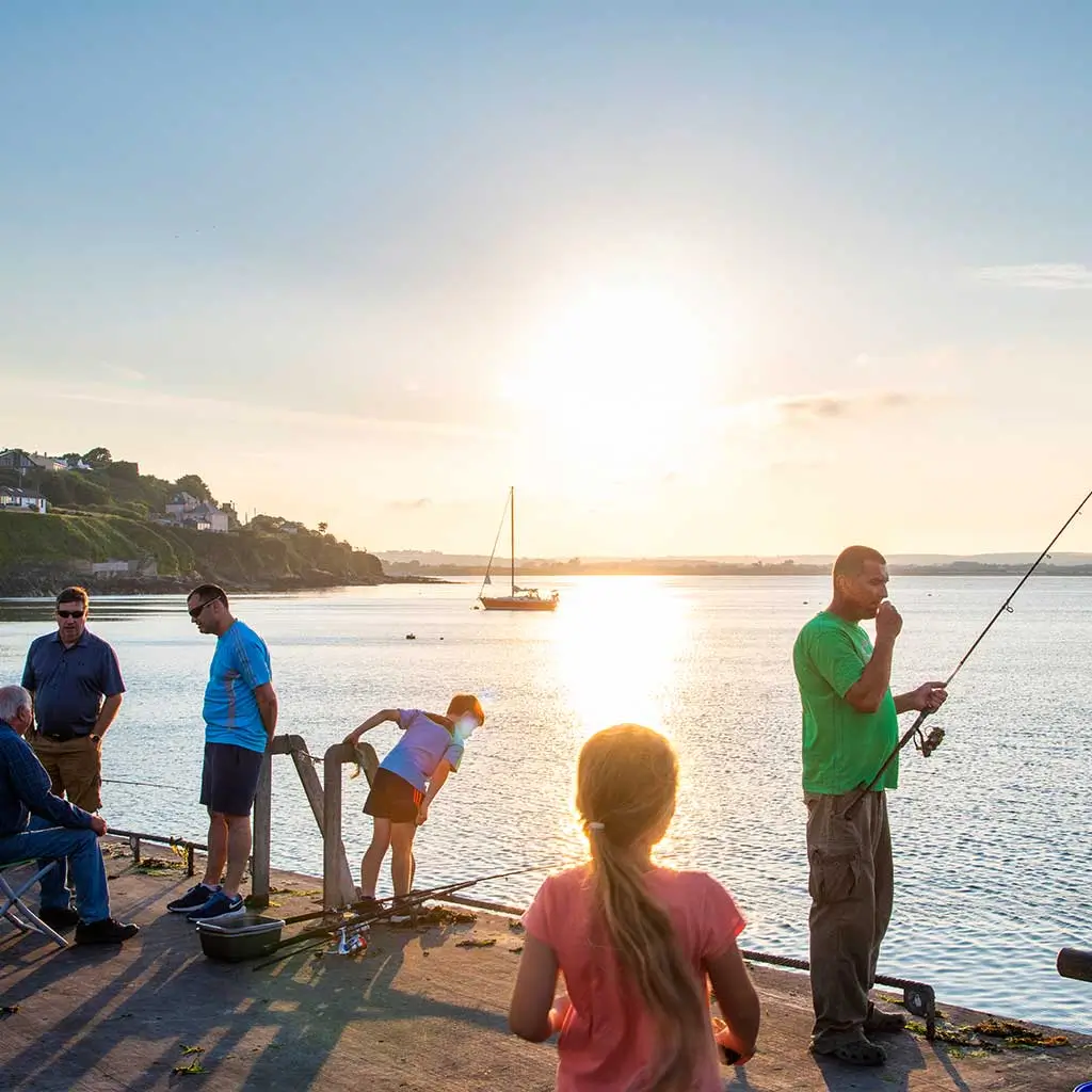 Fishing at sunset on Ballycotton Harbour near Garryvoe in East Cork © Failte Ireland